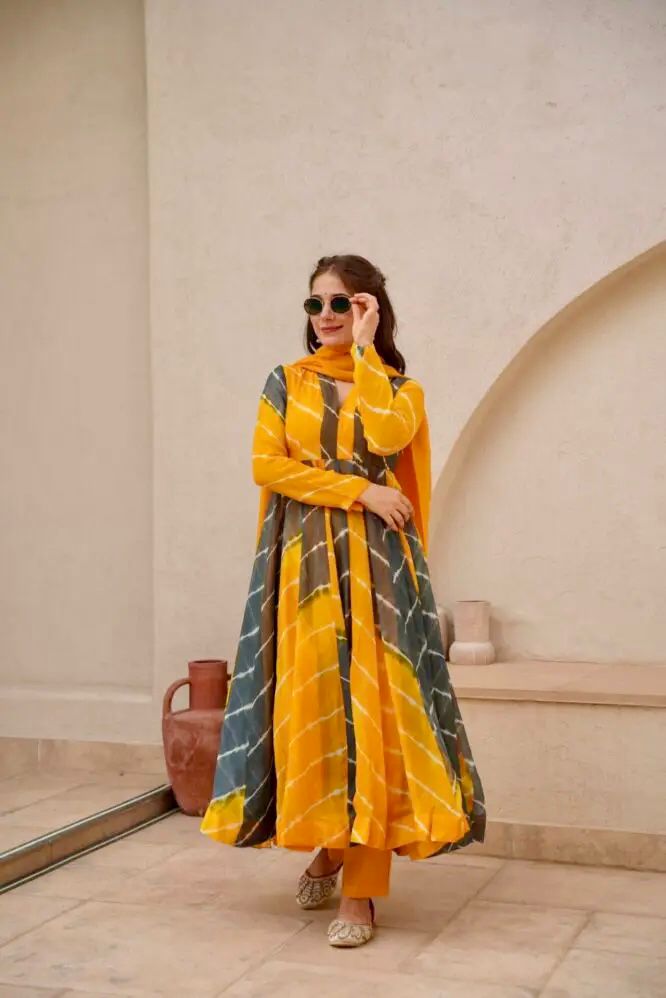 Attractive Party Wear Faux ANARKALI GOWN has a Regular-fit and is Made From High-Grade Fabrics And Yarn