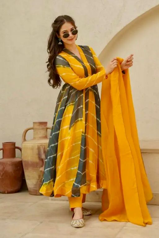 Attractive Party Wear Faux ANARKALI GOWN has a Regular-fit and is Made From High-Grade Fabrics And Yarn