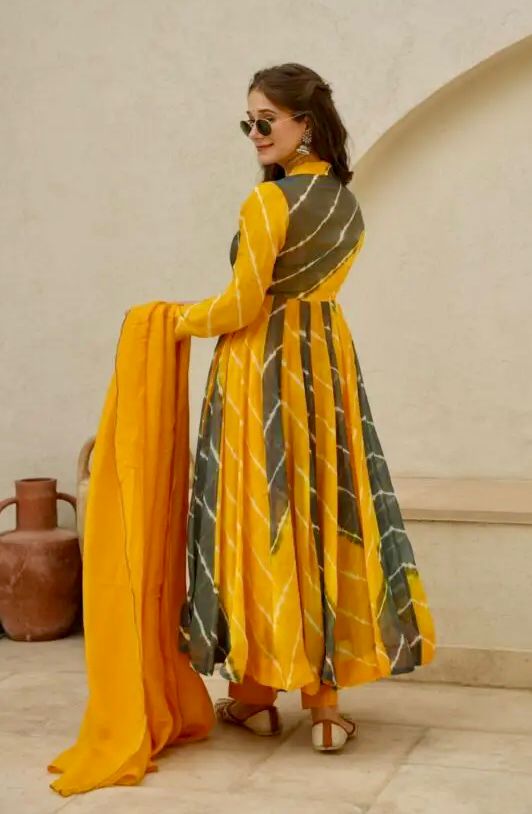 Attractive Party Wear Faux ANARKALI GOWN has a Regular-fit and is Made From High-Grade Fabrics And Yarn