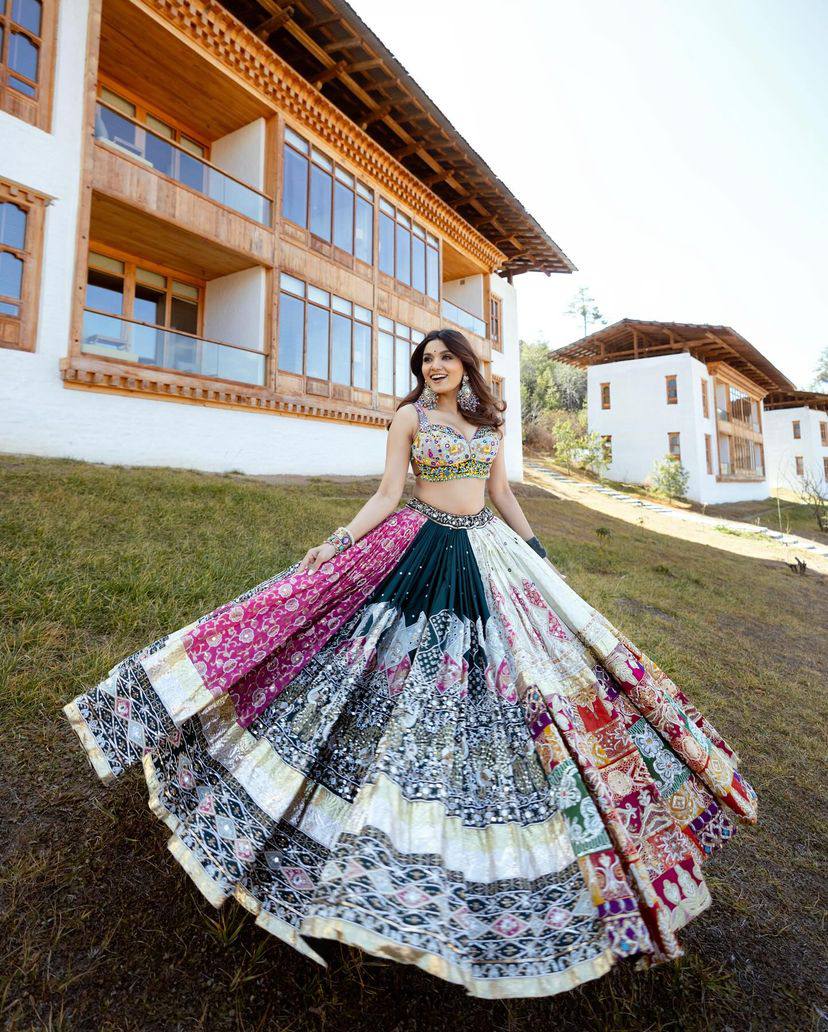 Buy This heavy muslin white lengha, adorned with vibrant and colorful traditional digital prints. Navratri Lengha ,Garba night Lengha Choli