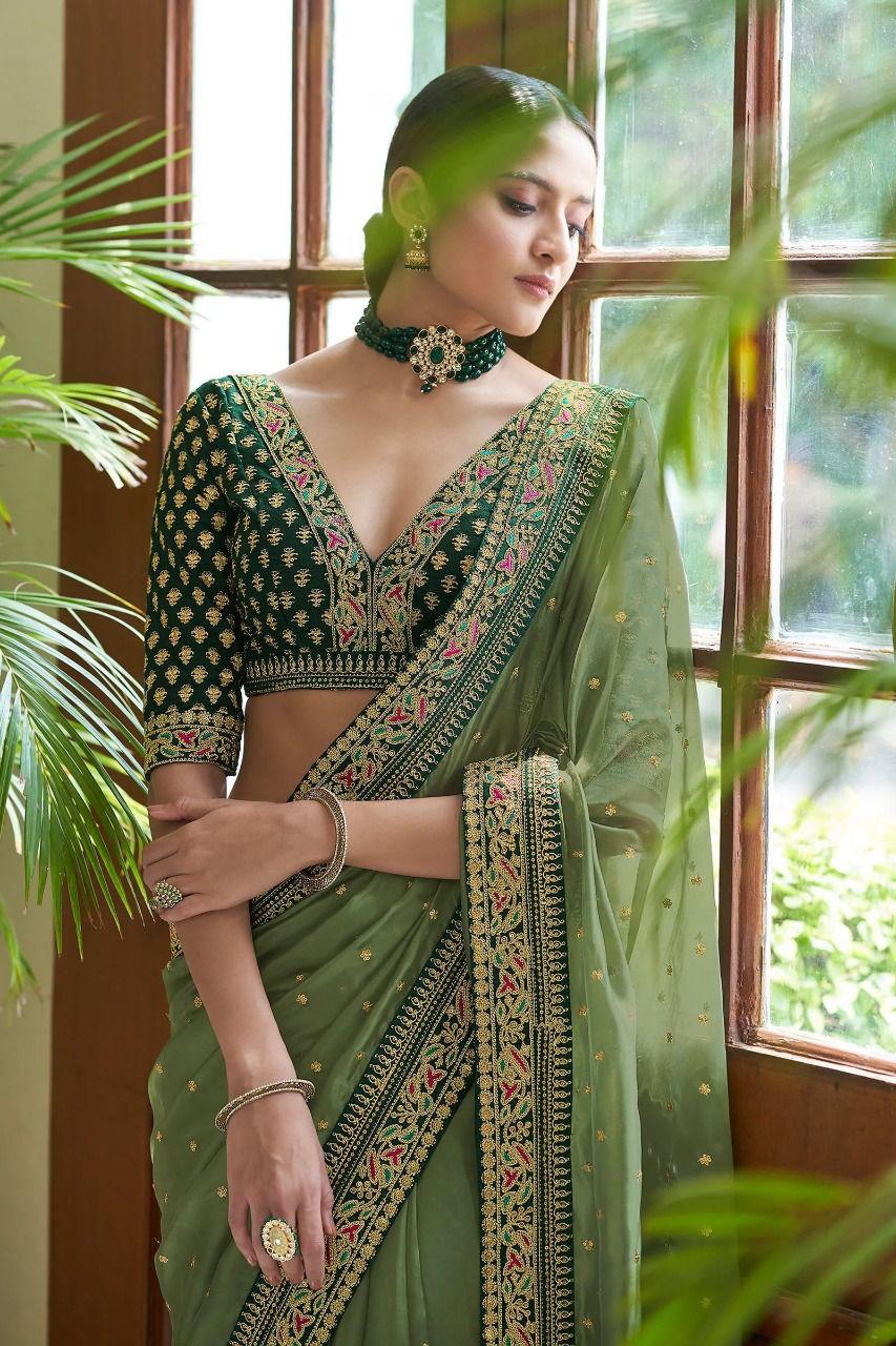 Looking some one for this same colour beautiful Designer Saree on premium Royal Organza fabric with digital printed with sequence Butti Fully embroidery lace border work