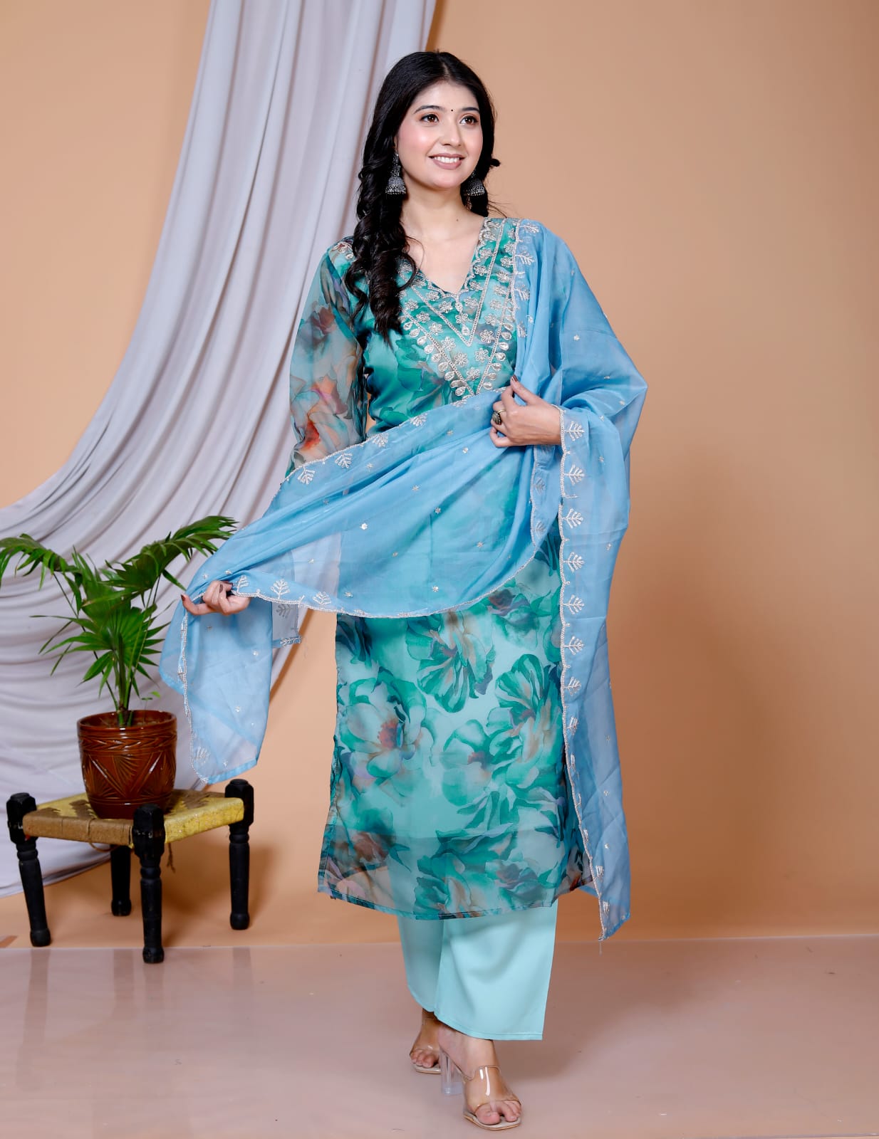 beautiful Heavy Suit Set which is beautifully decorated with intricate hand embroidery, Zari weaving . It is paired with matching pants and embroidery Dupatta.