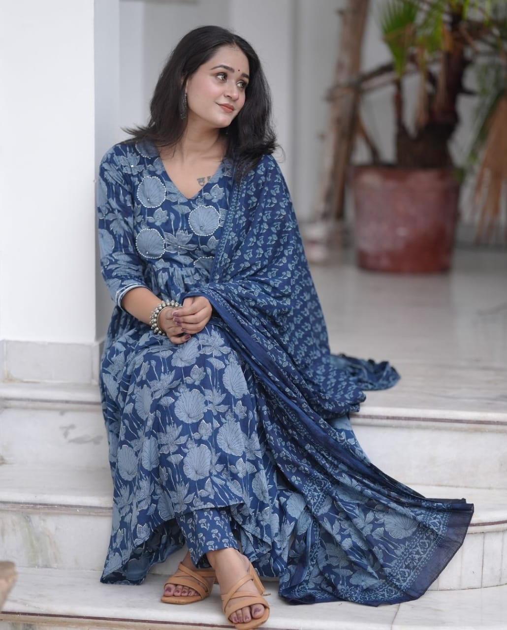 Look classy and elegant  in our  flower print cotton mystic  colour  which is perfect  for the festive season