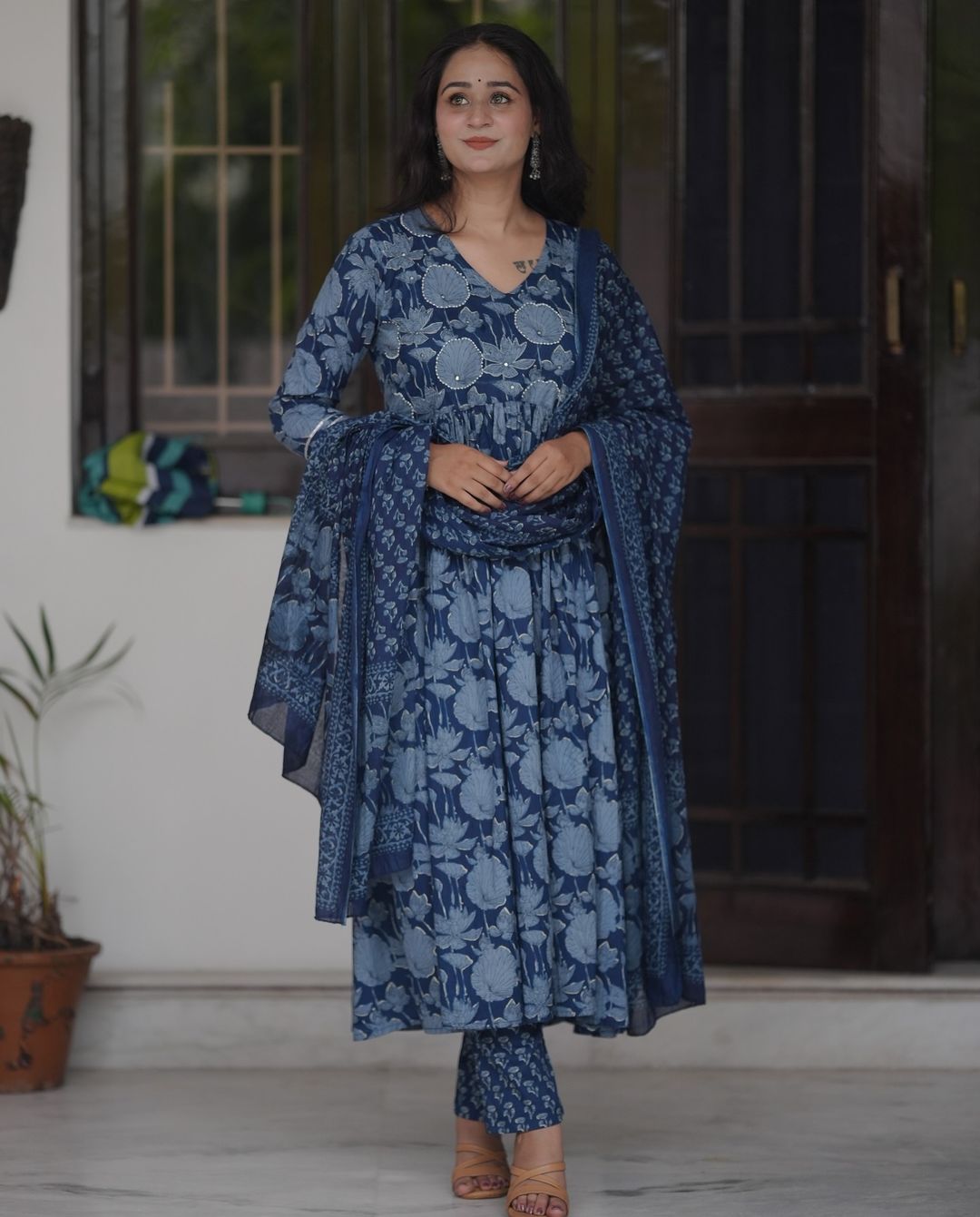 Look classy and elegant  in our  flower print cotton mystic  colour  which is perfect  for the festive season