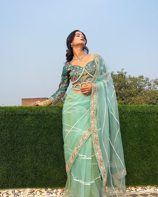 NEW SUPERHIT DESIGN ON NET FABRIC WITH HEAVY EMBROIDERY AND PEARL MOTI WORK SAREE AND BLOUSE