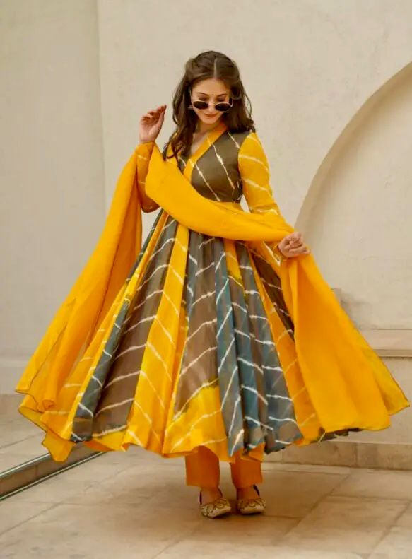 Attractive Party Wear Faux ANARKALI GOWN has a Regular-fit and is Made From High-Grade Fabrics And Yarn