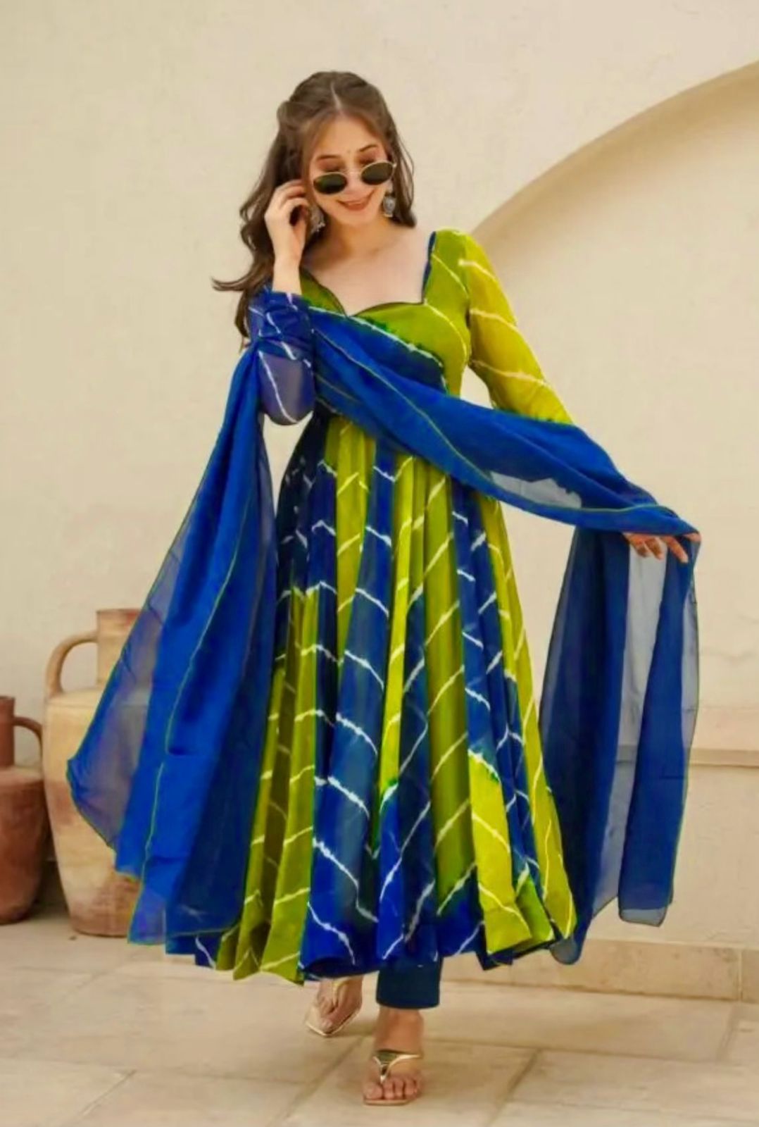 Attractive Party Wear Faux ANARKALI GOWN has a Regular-fit and is Made From High-Grade Fabrics And Yarn