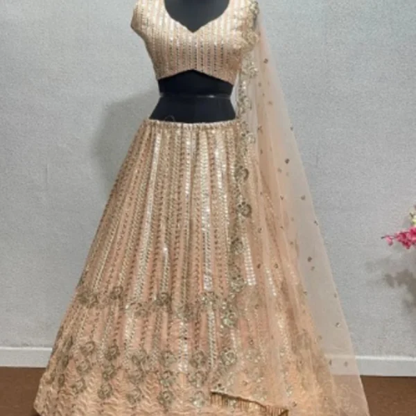Stunning Bollywood-style designer lehenga choli inspired by Sabyasachi, featuring intricate mirror work, sequin embroidery, and a stylish crop blouse – perfect for Indian weddings, parties, and bridal wear